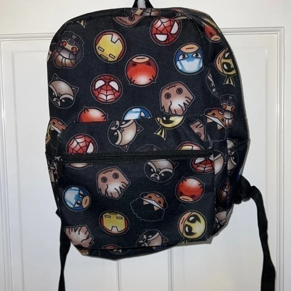 Marvel backpack. Some scuffs throughout but otherwise in good condition.